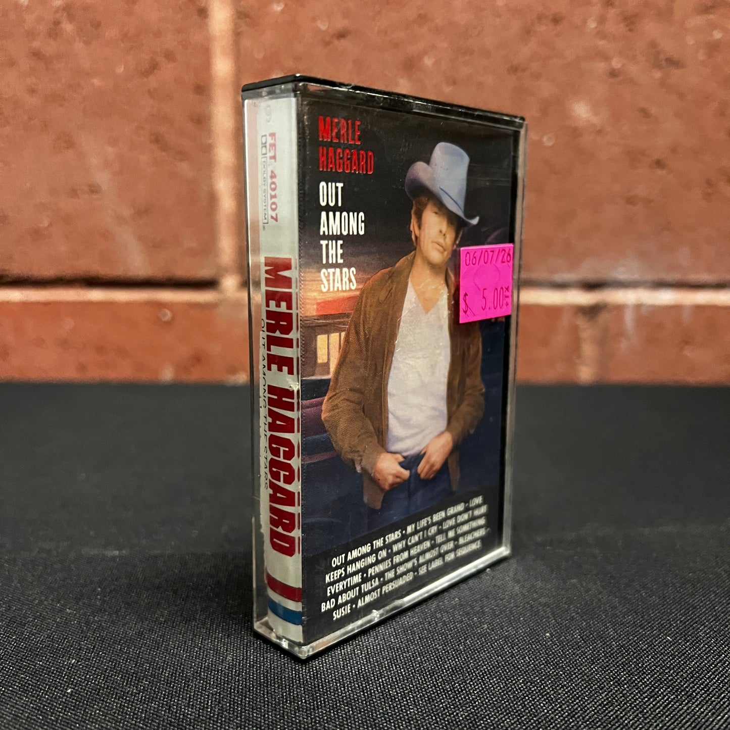 Used Cassette: Merle Haggard "Out Among The Stars" Tape