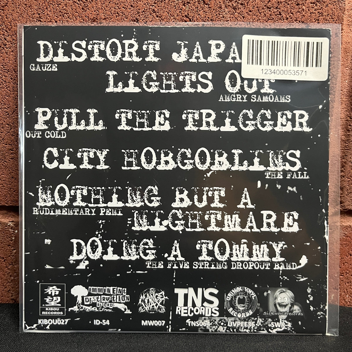 Used Vinyl: The Domestics "Pissing On Perfection" 7" (Clear w/Yellow Splatter Vinyl)