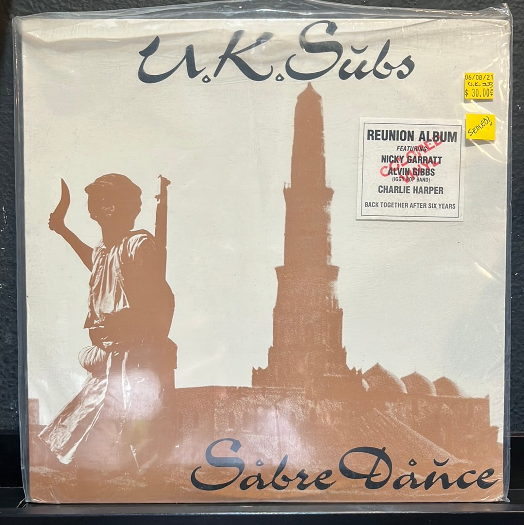 Used Vinyl: UK Subs “Sabre Dance” LP (Clear Orange Vinyl)