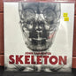 Used Vinyl: John Carpenter "Skeleton" 12" (Clear with black splatter vinyl)