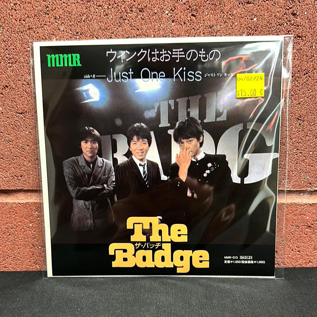 Used Vinyl: The Badge "A wink is in your hands" 7" (Japanese Press)