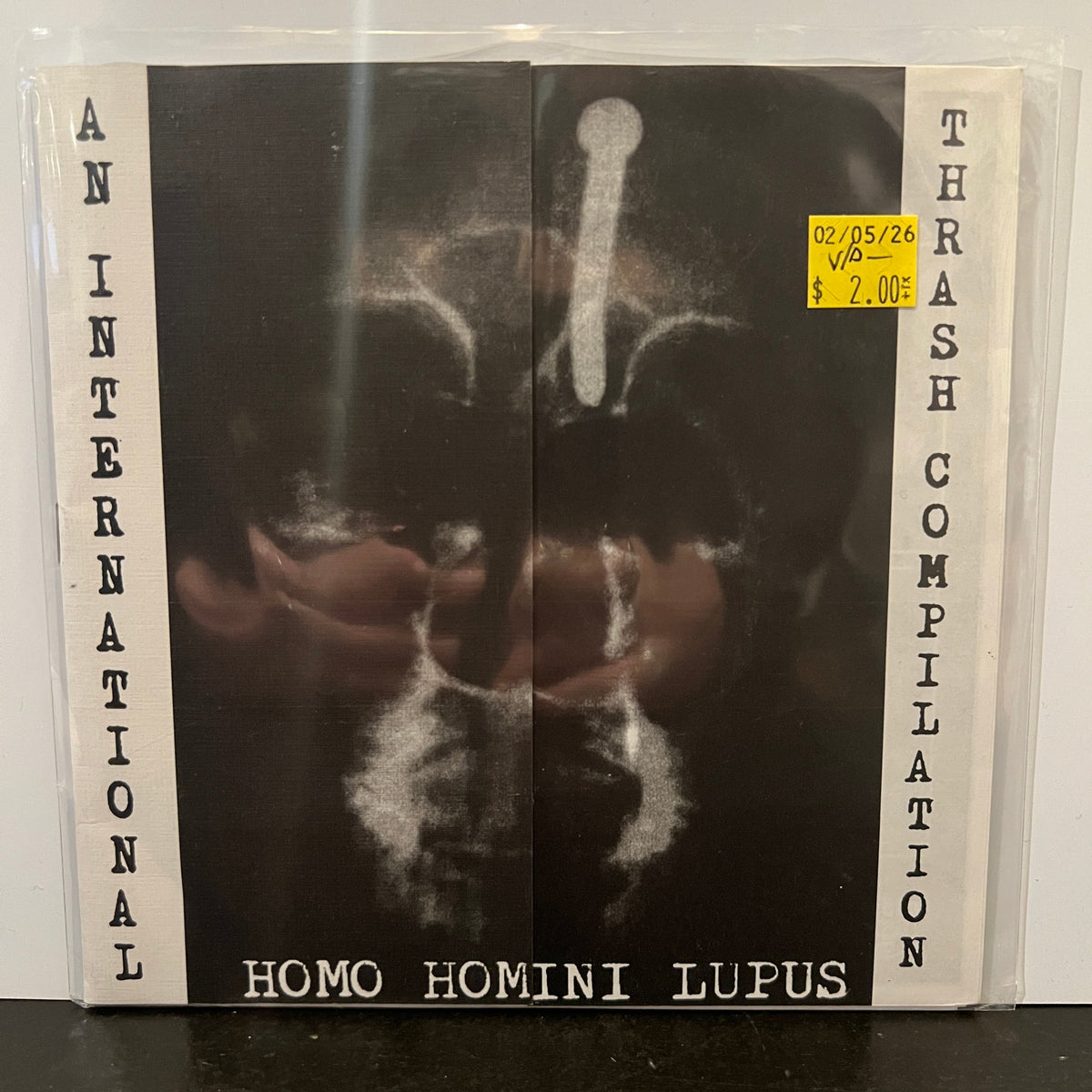 Used Vinyl: V/A - "Homo Homini Lupus" 7" (1998 Press)