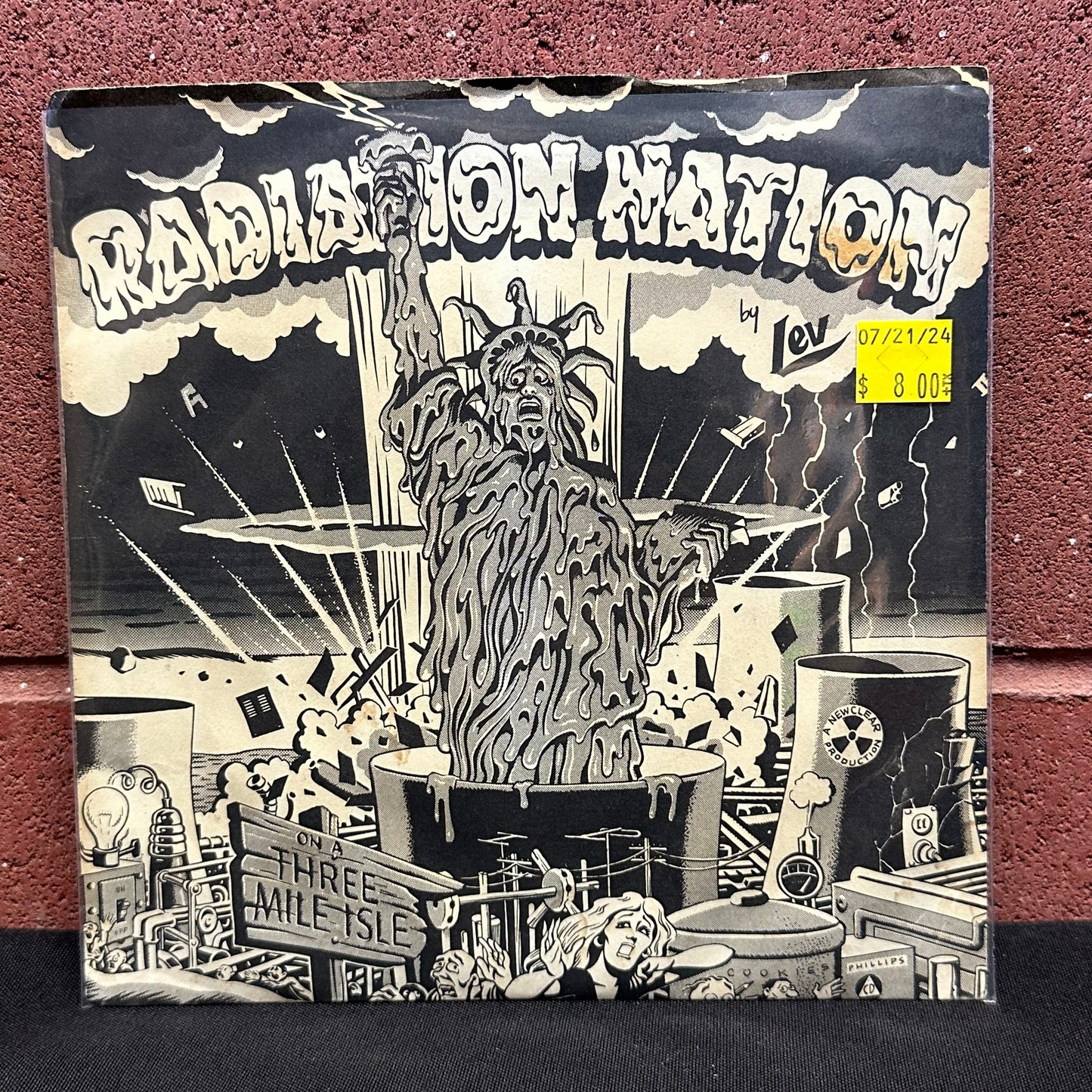 Used Vinyl: Mark A. Levy, Rick Kirby And The Vigilantes "Radiation Nation On A 3-Mile Isle / Overexposed" 7"