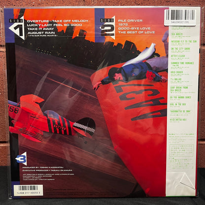 Used Vinyl: Toshiki Kadomatsu "Touch And Go" LP (1986 Japanese Press)