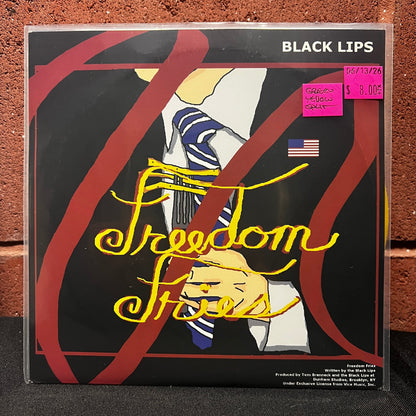 Used Vinyl: The Black Lips / The Coathangers "Freedom Fries / Watch Your Back" 7" (Green & Yellow Split Vinyl)