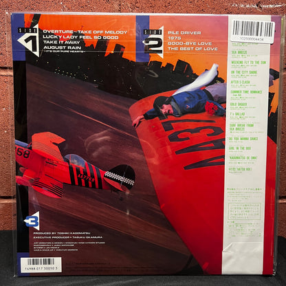 Used Vinyl: Toshiki Kadomatsu "Touch And Go" LP (1986 Japanese Press)