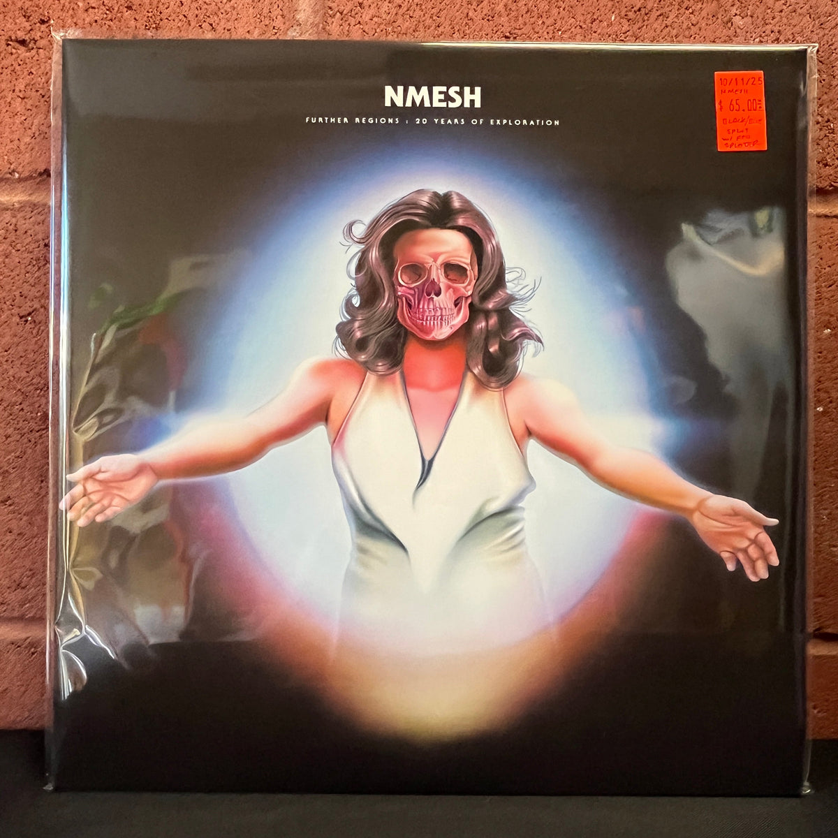 Used Vinyl: Nmesh "Further Regions: 20 Years Of Exploration" 2xLP (Black/Blue Split with Red Splatter vinyl)